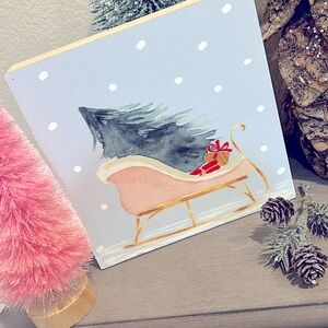 New Christmas holiday pink sleigh with Christmas tree and presents